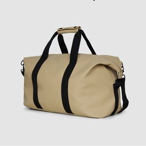 NEW Rains Tan Duffel Bag with Black Straps